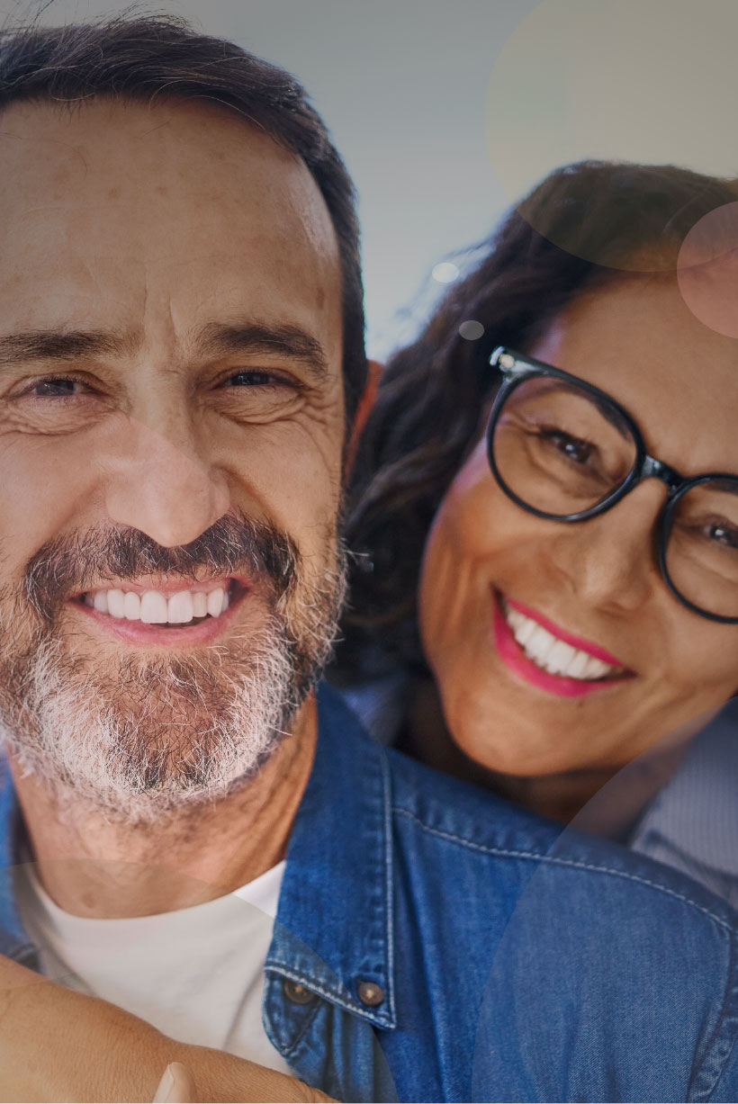 Older Couple Smiling After Teeth Whitening