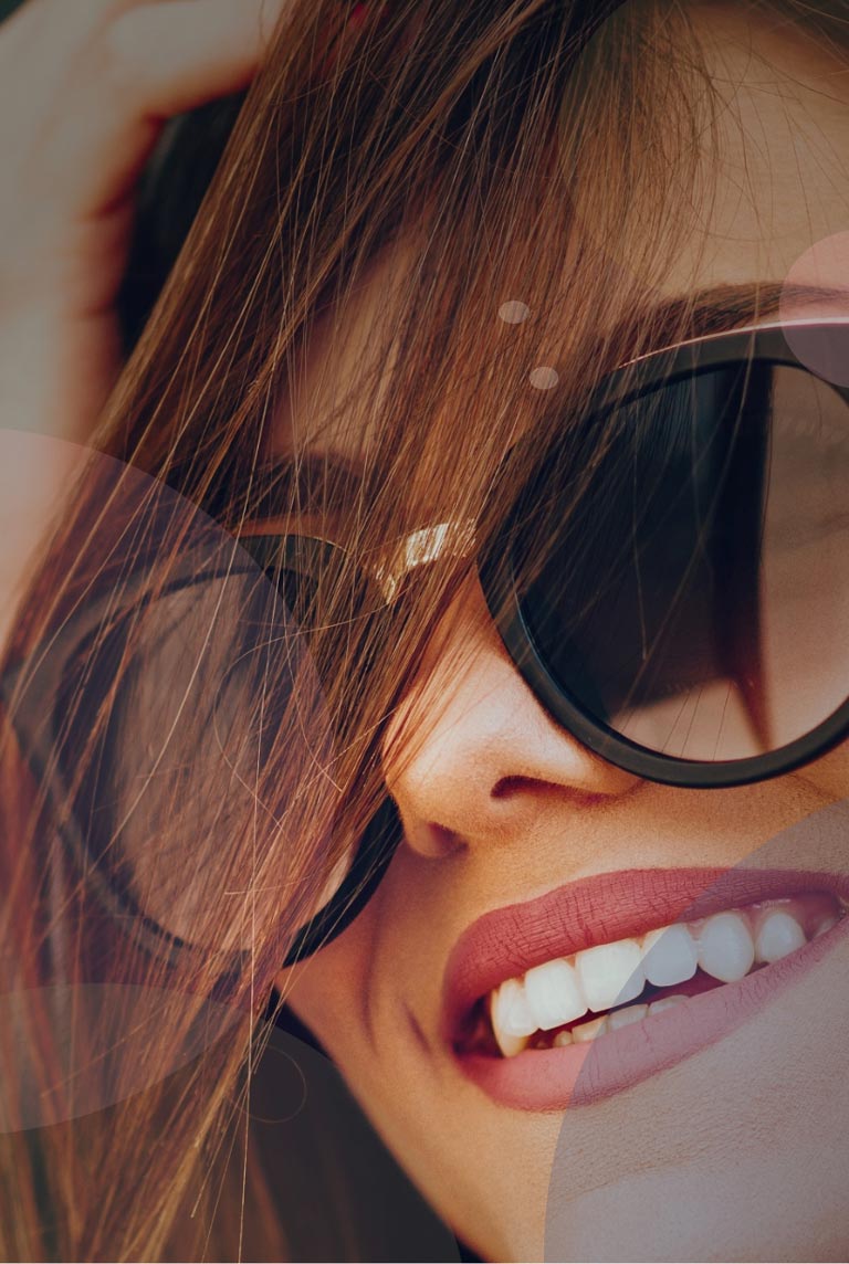 Woman Smiling Confidently After Professional Teeth Whitening